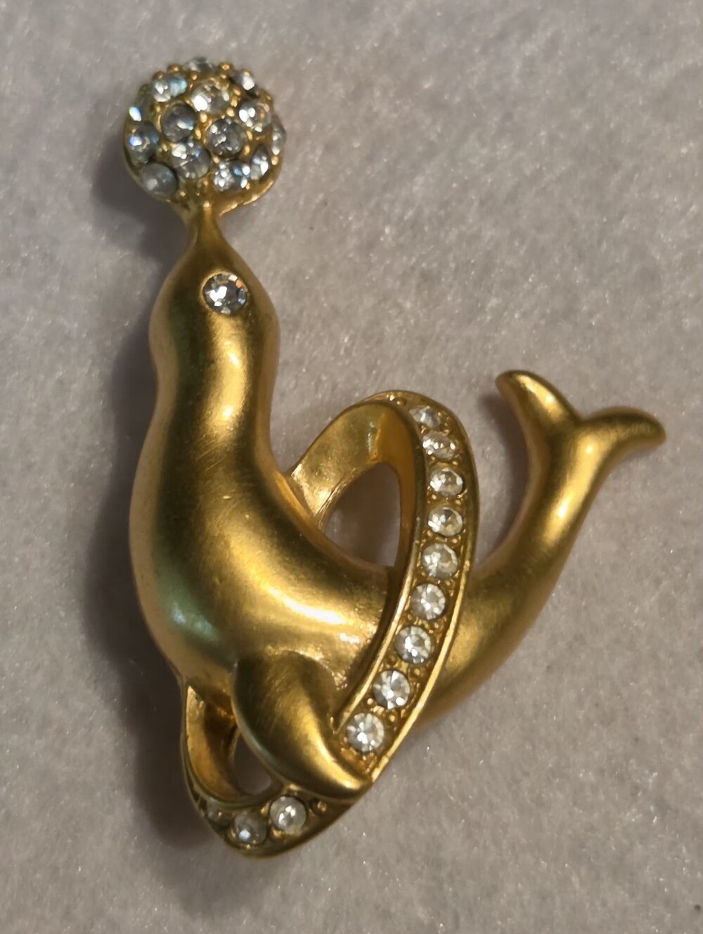 Gold-Tone Sea Lion Brooch with Clear Crystals
